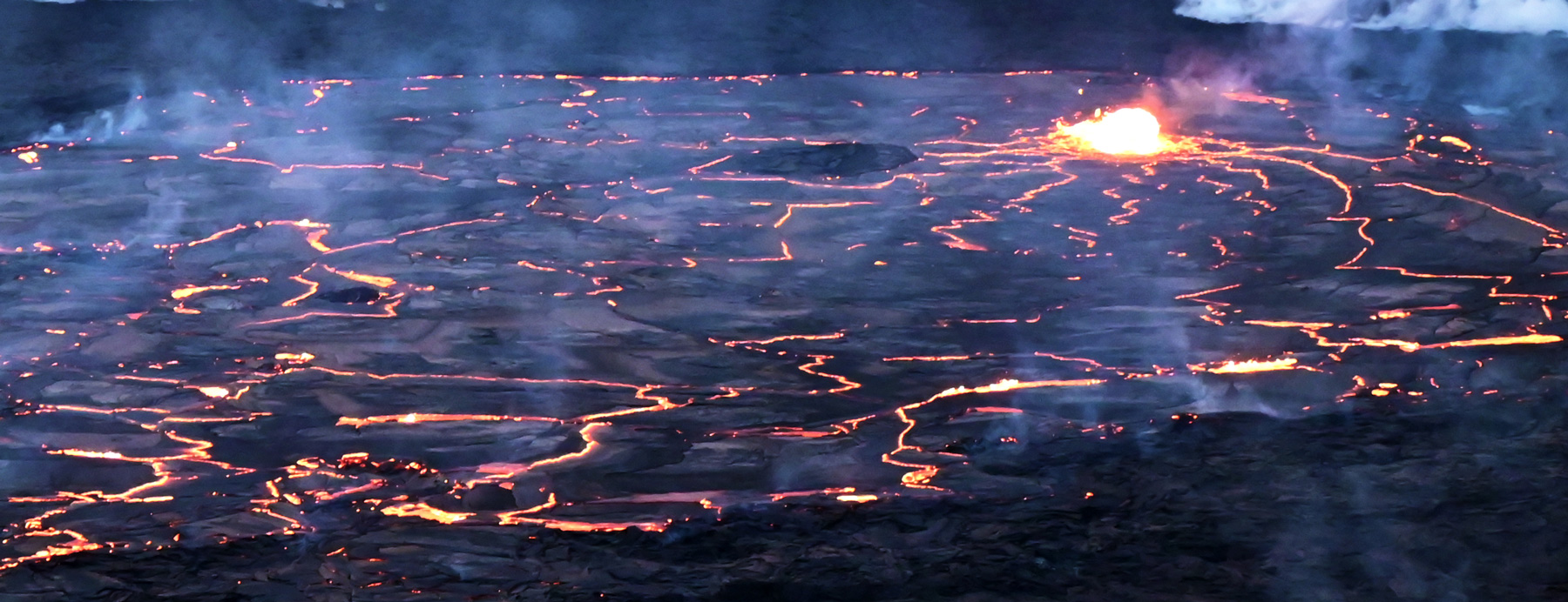 Close up view of lava lake and lava fountain in a crater of a volcano